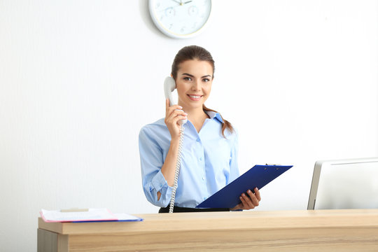 Receptionist answering business calls